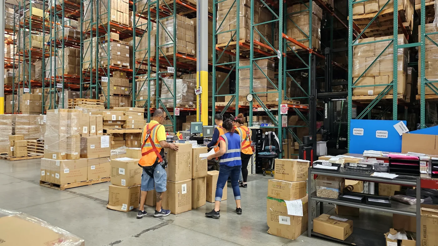 Tactical receiving team processing cartons